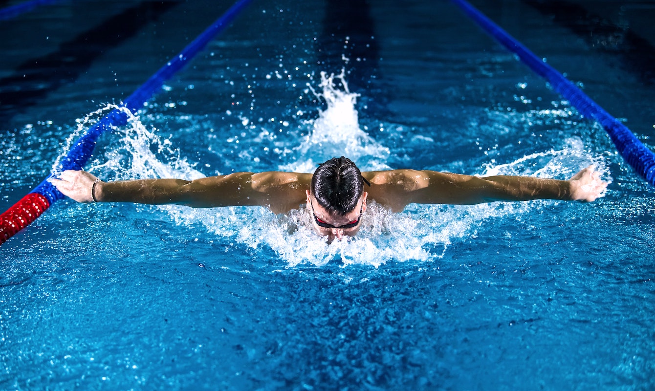 Competitive swimming training. Butterfly stroke