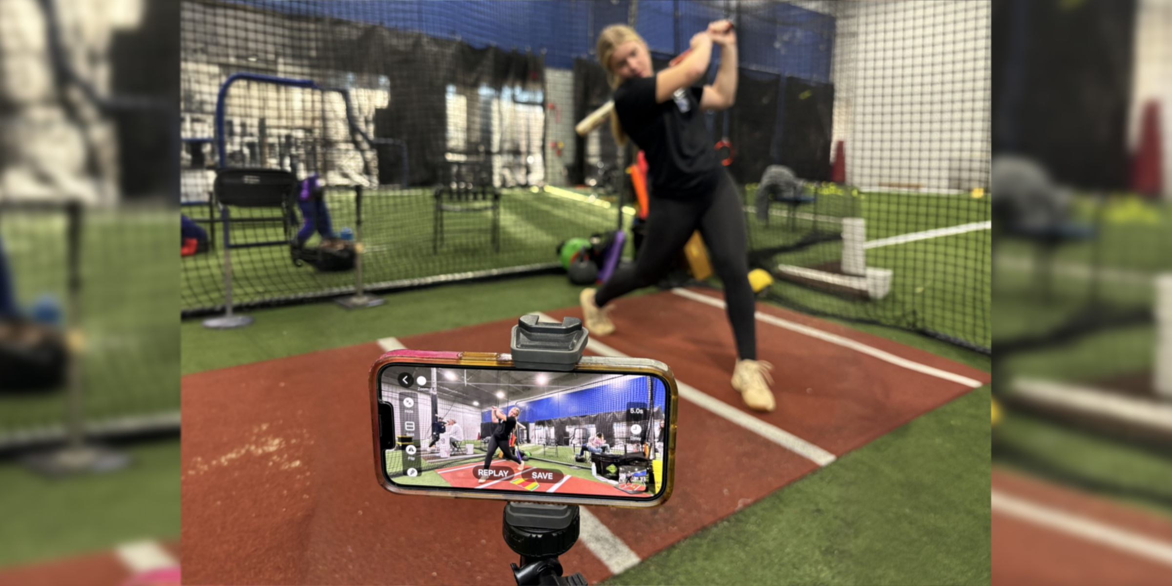 girl during the softball hitting practice with the video delay instant replay app