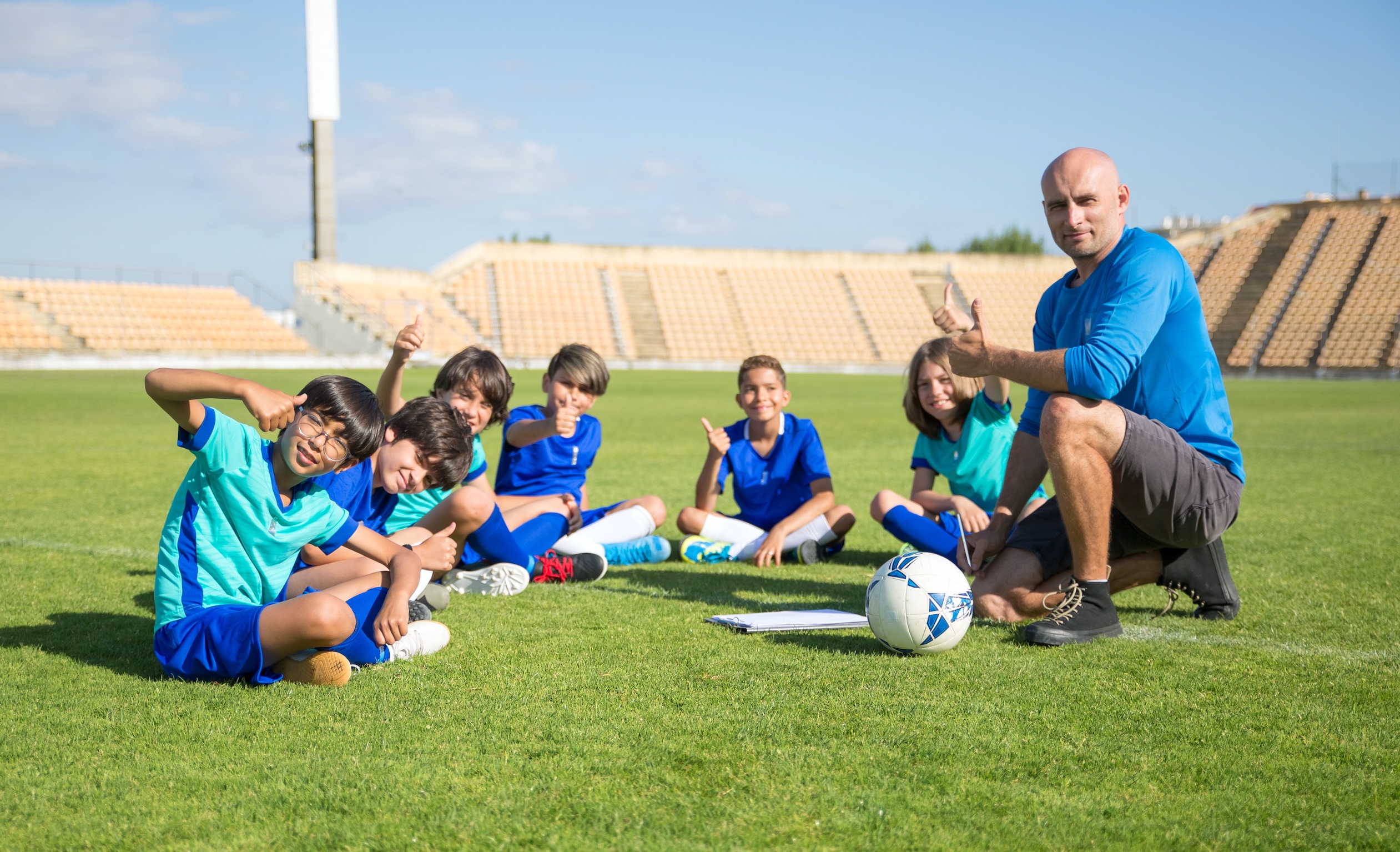 soccer team after practice - young players with coach